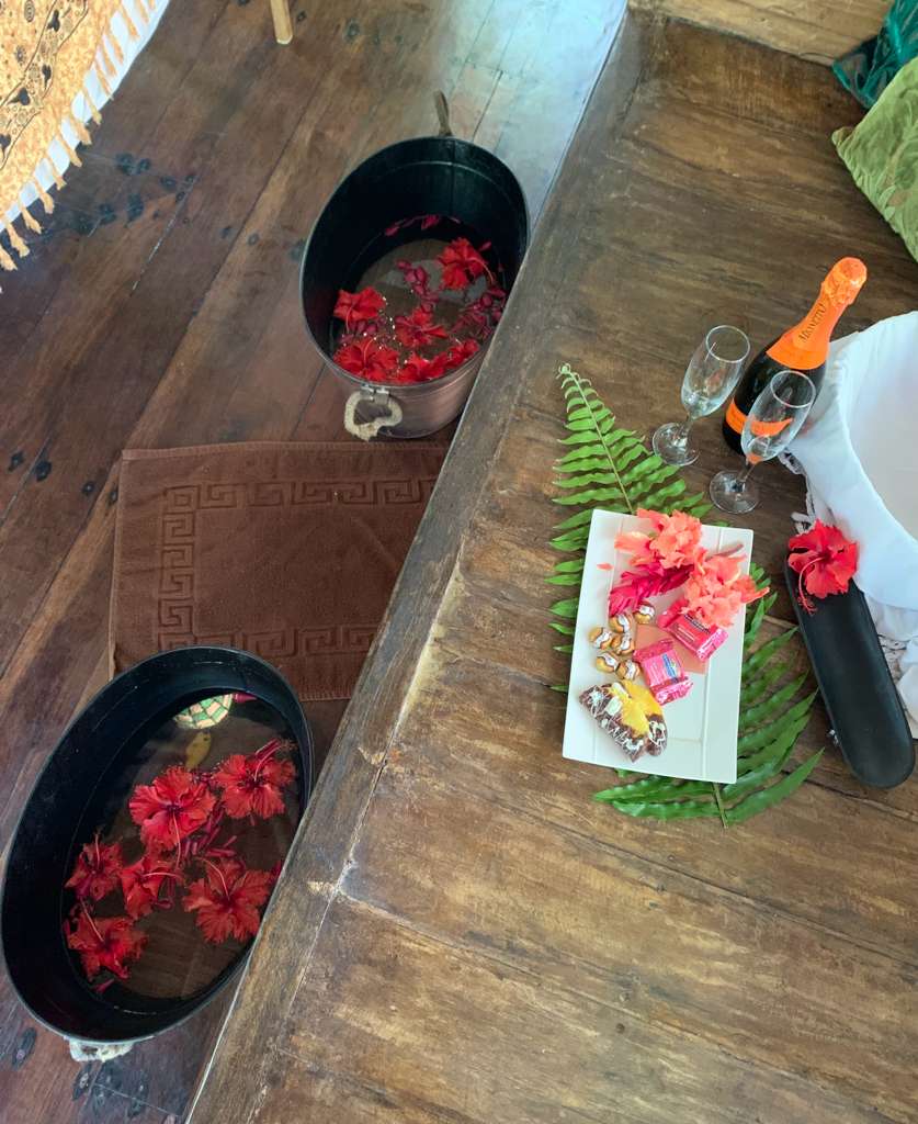 Foot bath with sparkling wine for a girls' spa day at Bluff Beach Jungle Spa