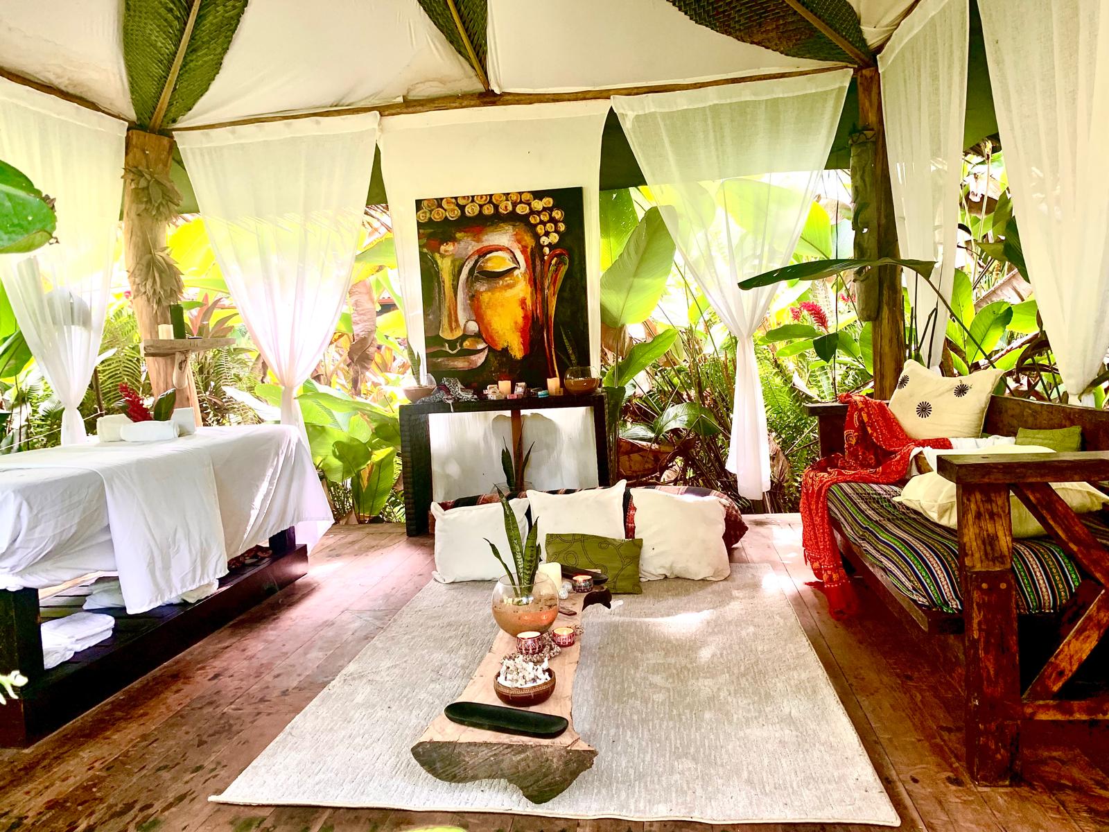 Open-air jungle spa cabana surrounded by rainforest at Bluff Beach Jungle Spa, Bocas del Toro